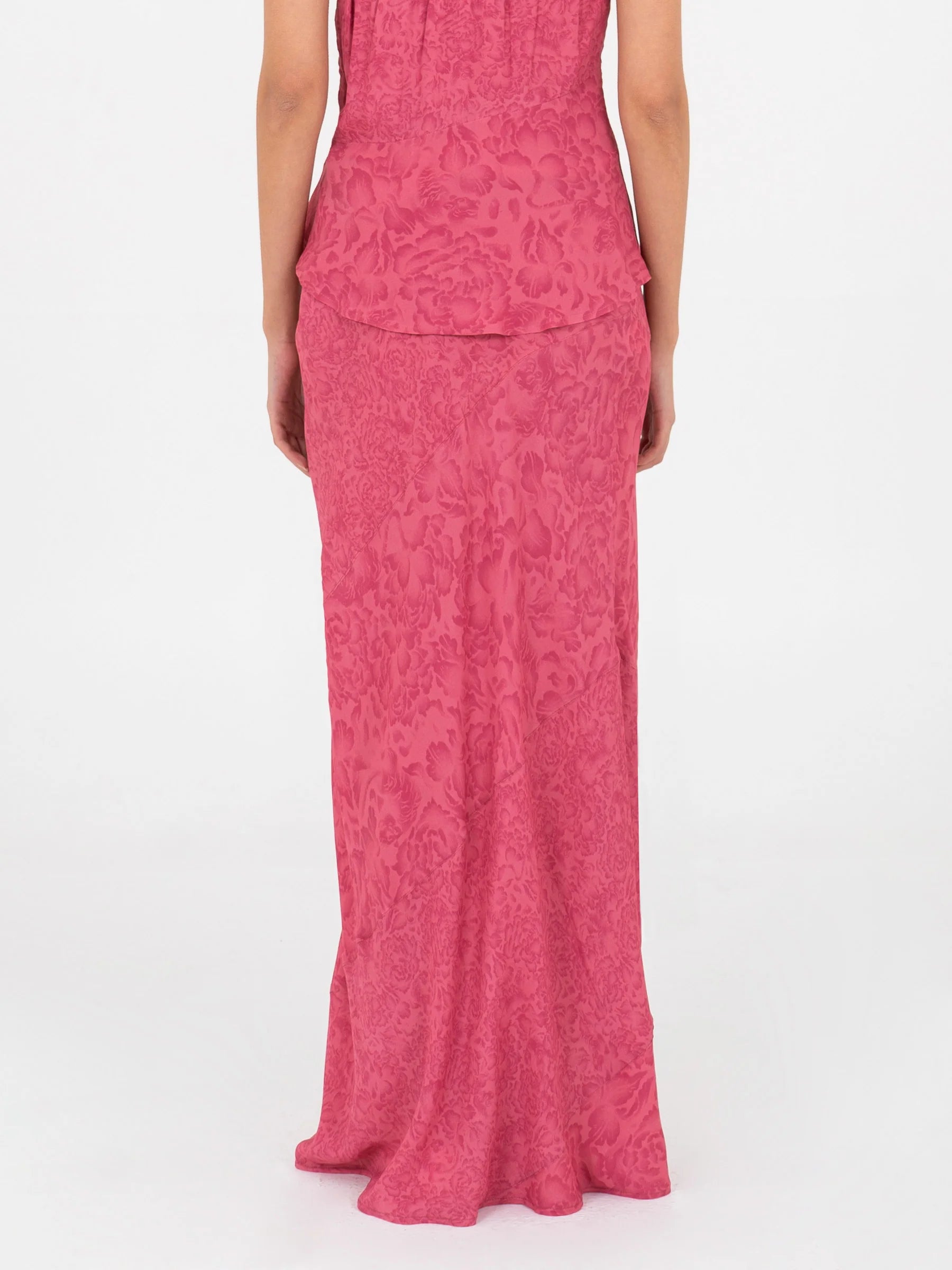 Pink long low rise skirt back view with smooth finish and invisible side zipper lightweight summer skirt