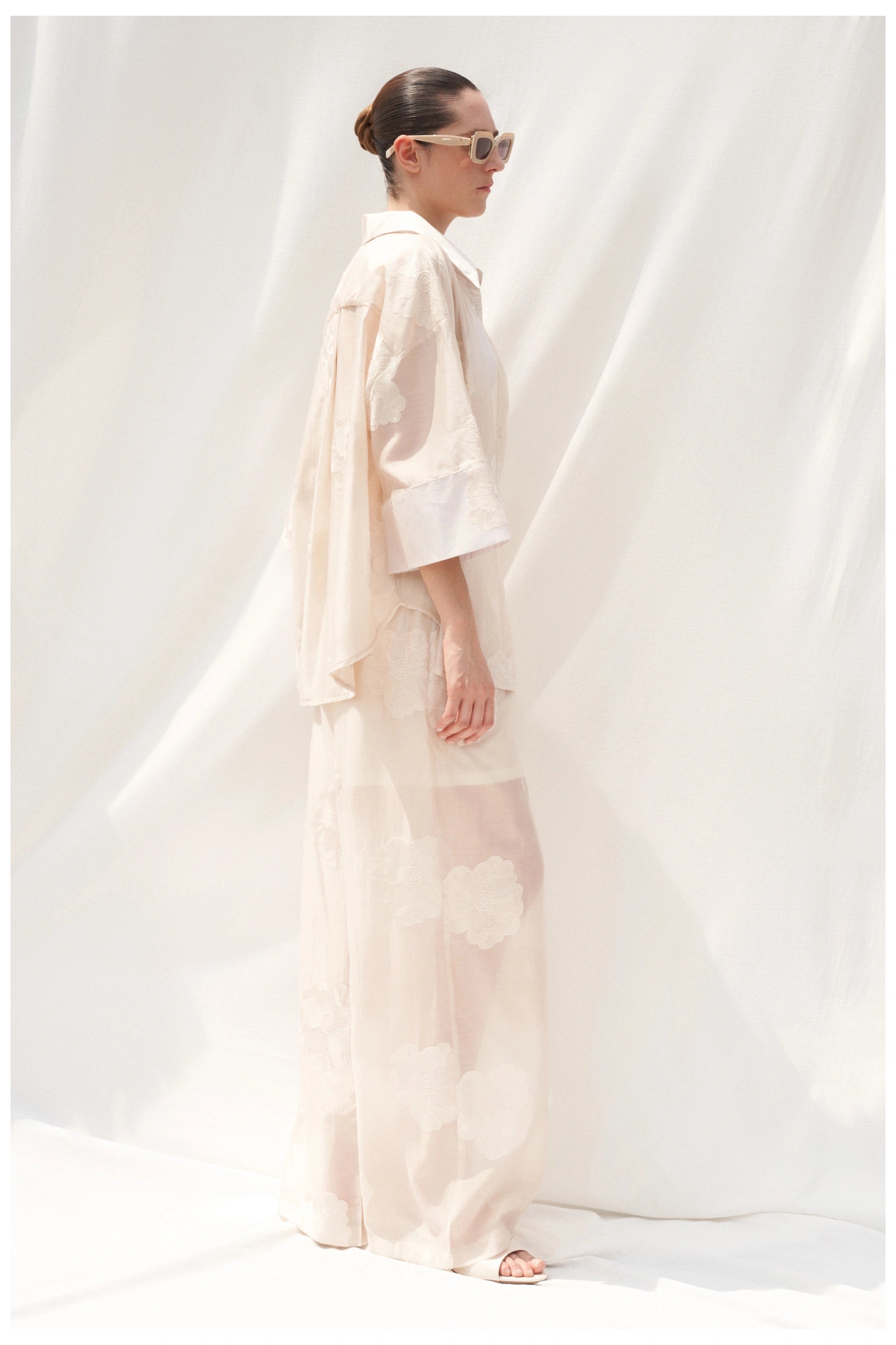 Beige embroidered shirt side view