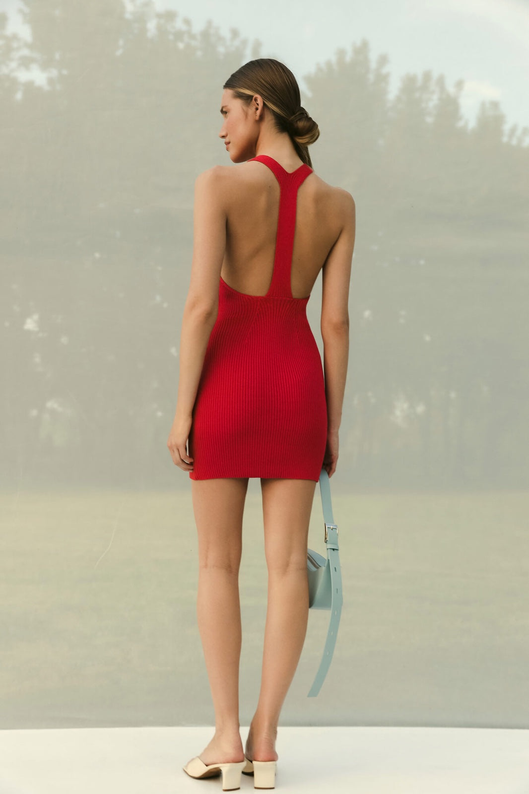 Red halter mini dress back view
