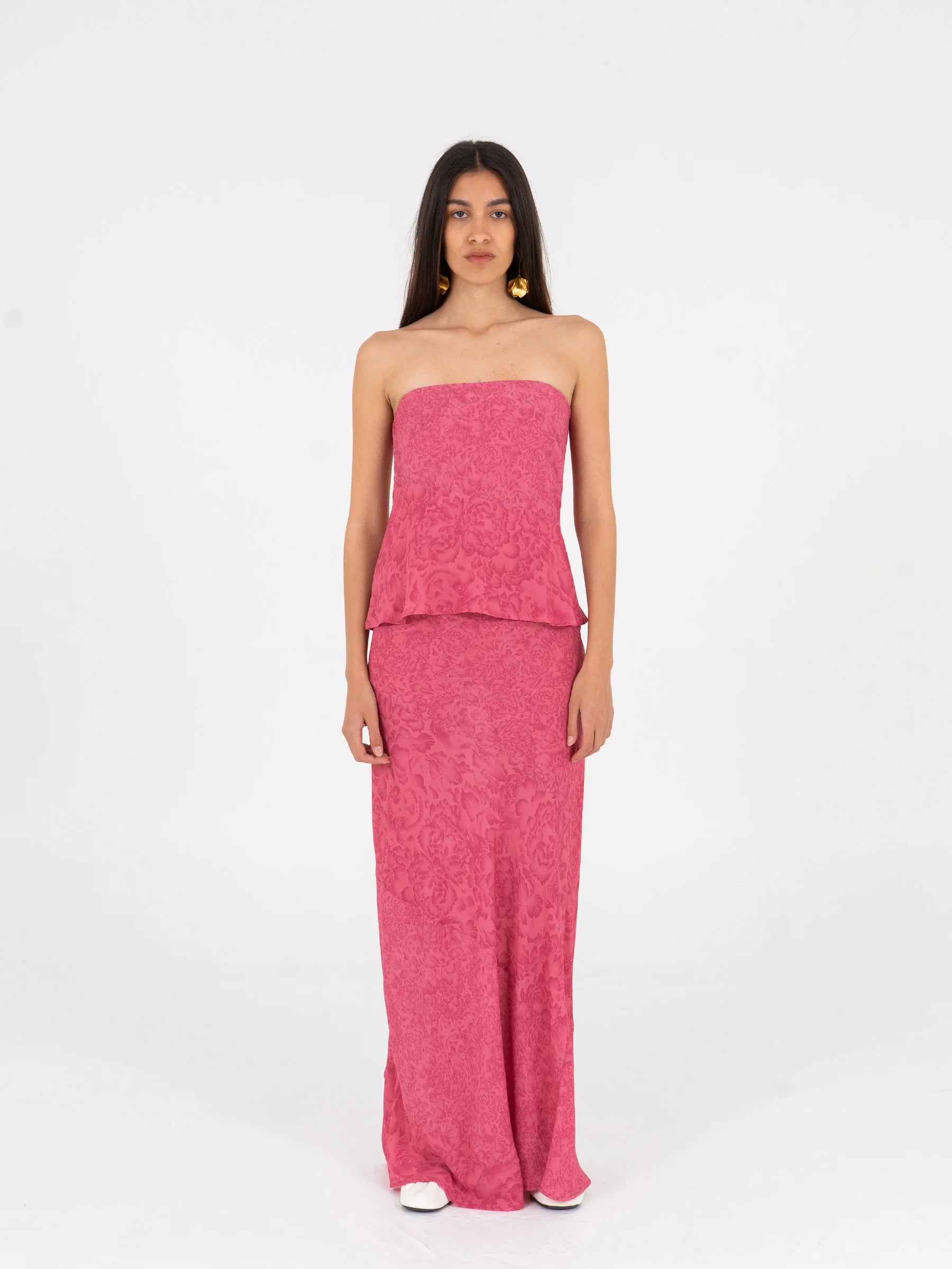 pink long low rise skirt front view with invisible side zipper elegant minimal silhouette