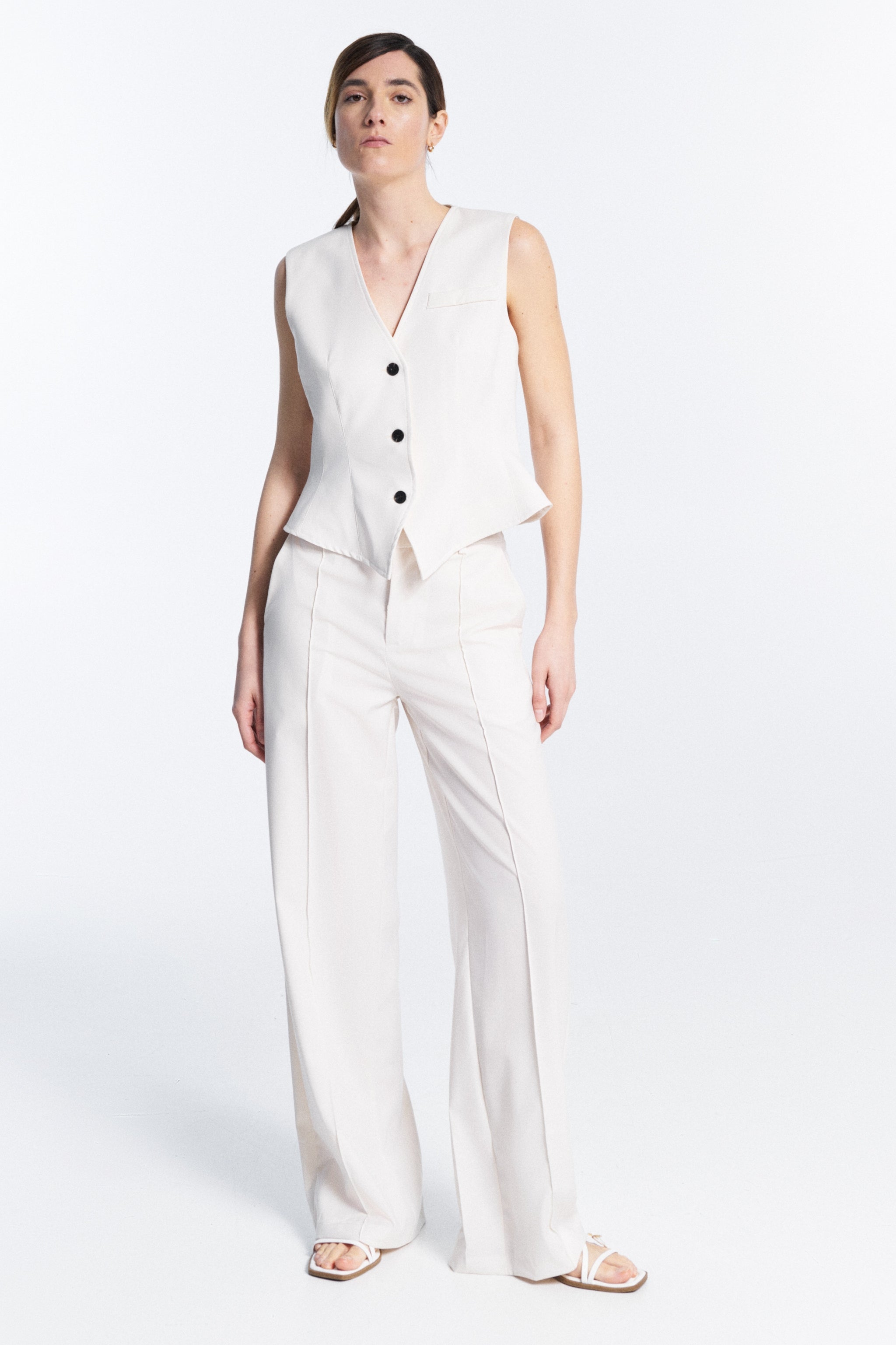 Serena Trousers white high waisted trousers front view with side pockets belt loops and central zip closure regular fit made in Italy