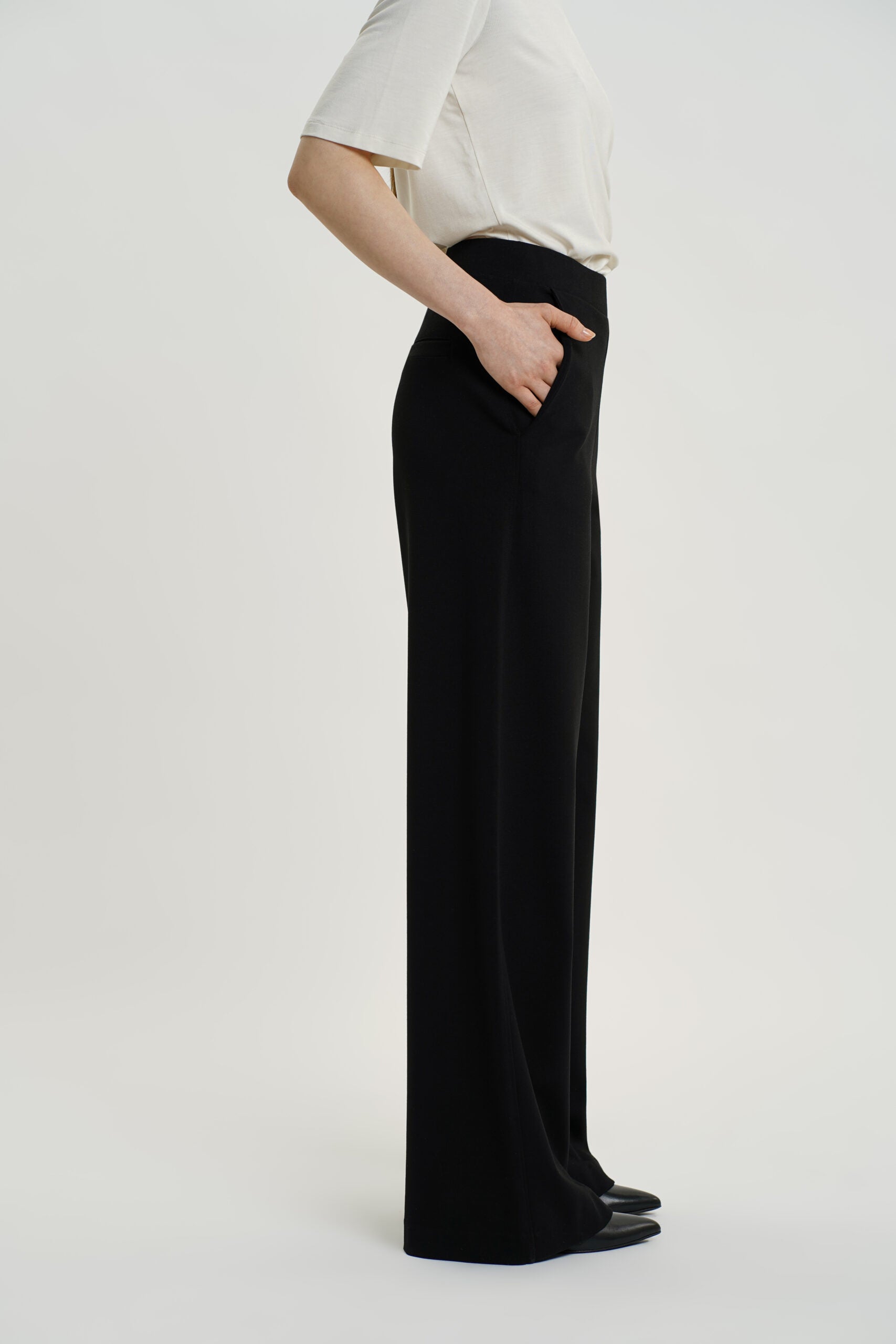 RESIDUS Black high waist trousers with full length wide legs and side pockets