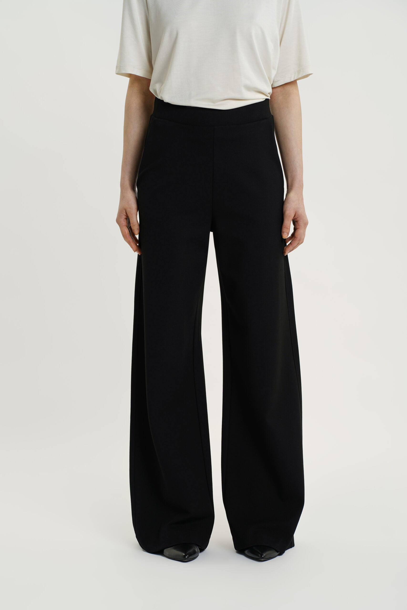 RESIDUS Black high waist trousers with full length wide legs and side pockets