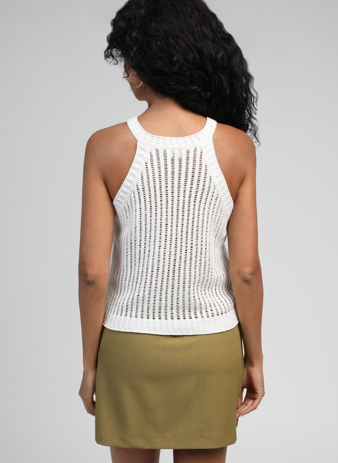 An’ge Libra Top ecru sleeveless knit top back view on model