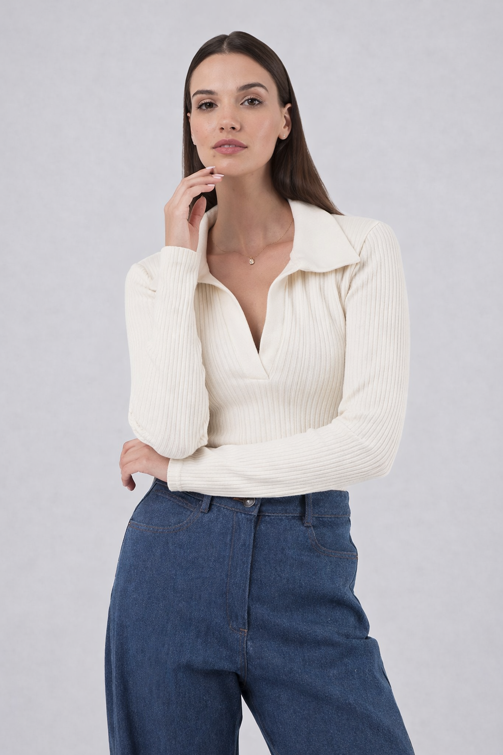 Ananke white knit long-sleeved top with deep V neckline front detail view