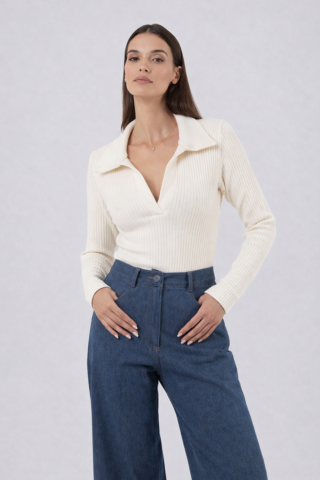 Ananke white knit long-sleeved top with deep V neckline front view