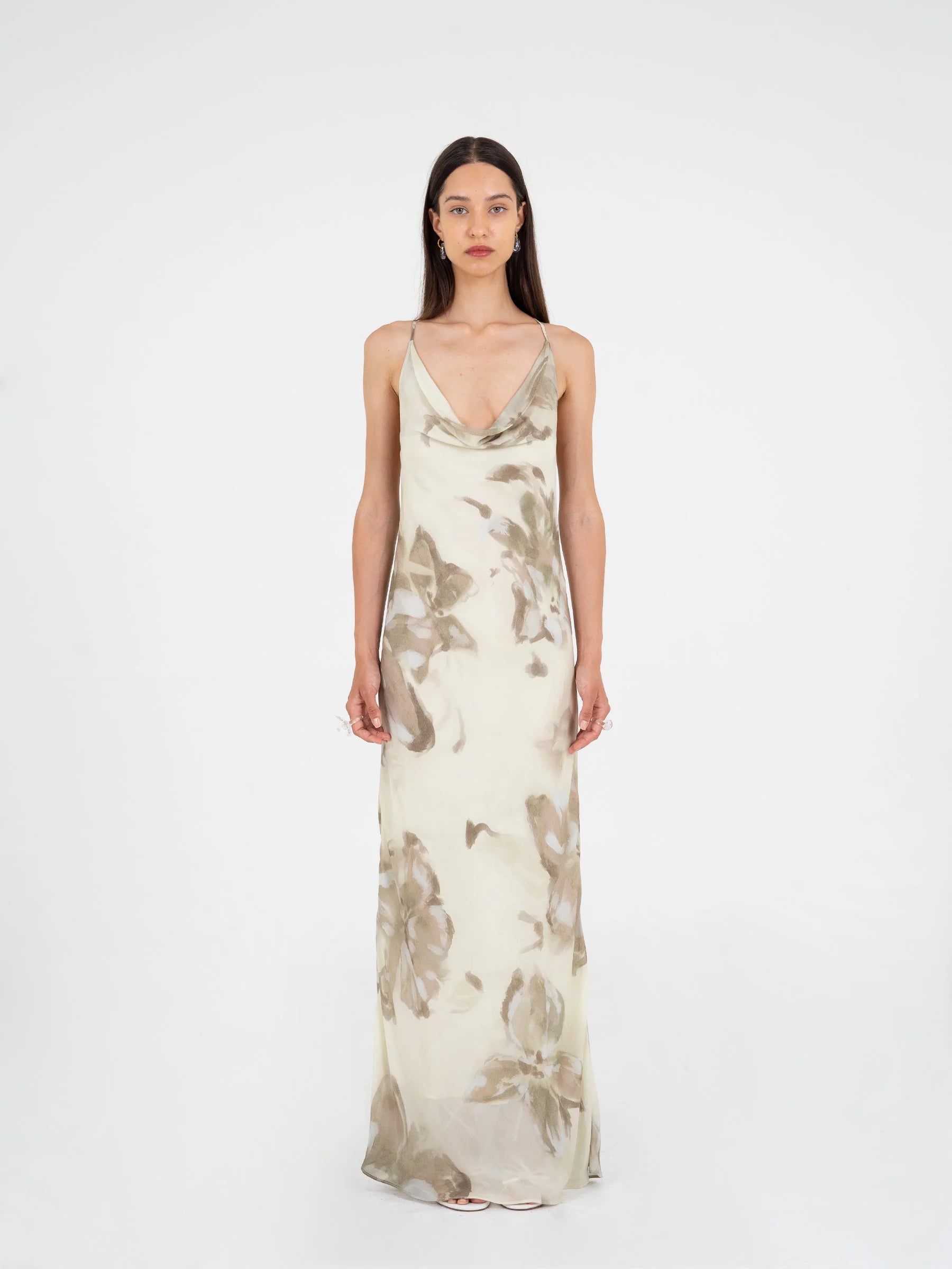 Beige floral printed maxi dress full length view with open back and crossed straps lined silhouette