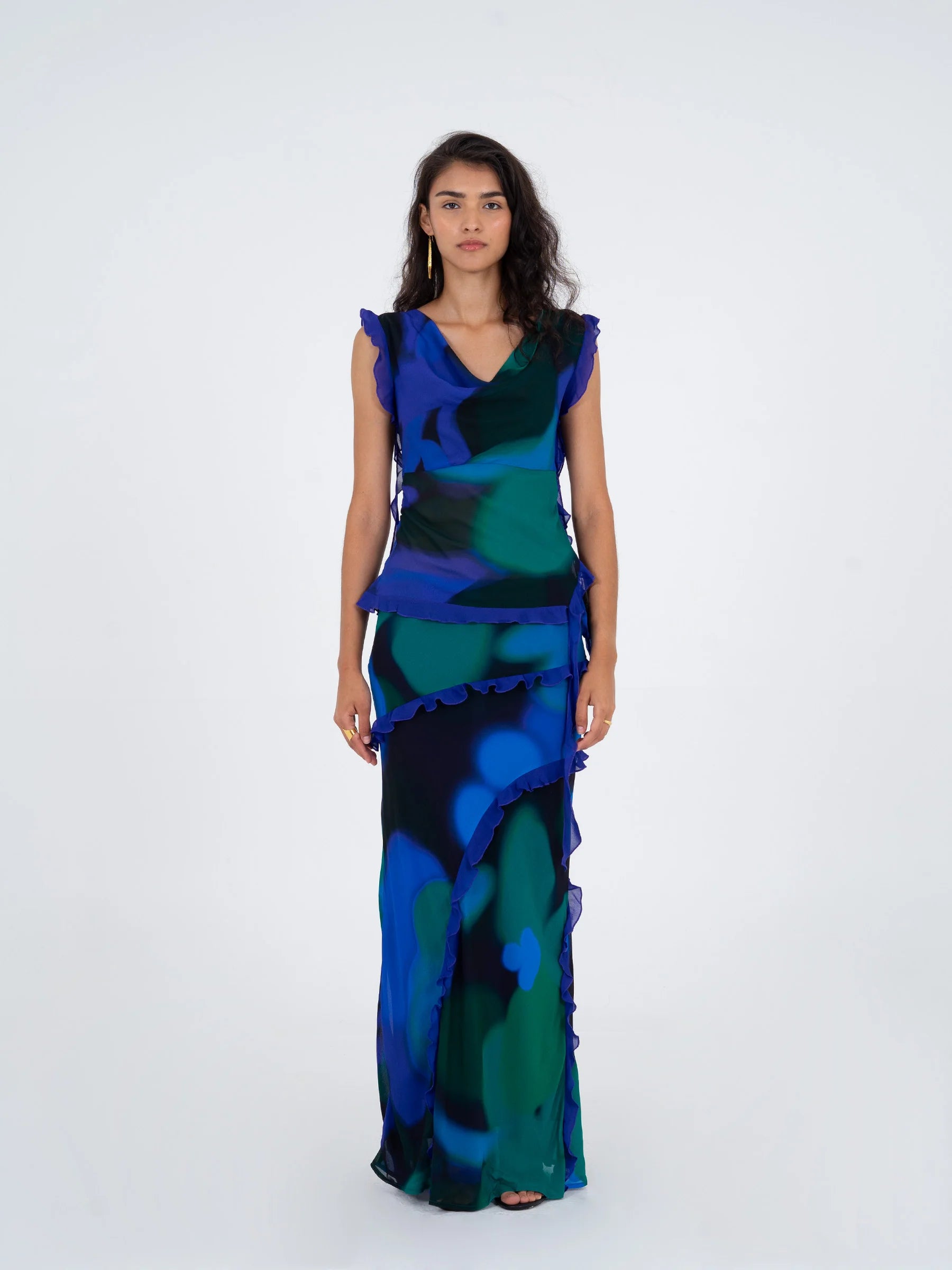 Blue multicolor printed long skirt detail view showing ruffle finish and fabric movement