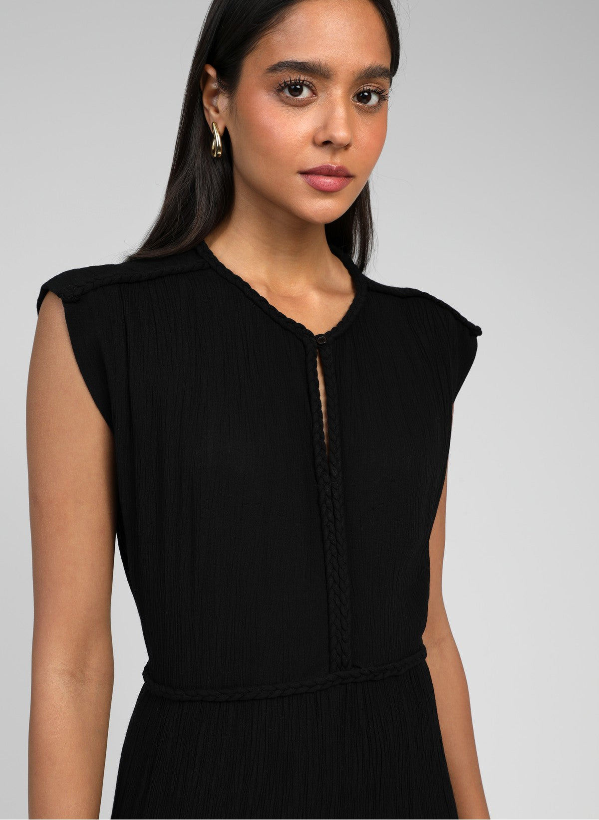 Clara dress black sleeveless v-neck midi dress close up front detail