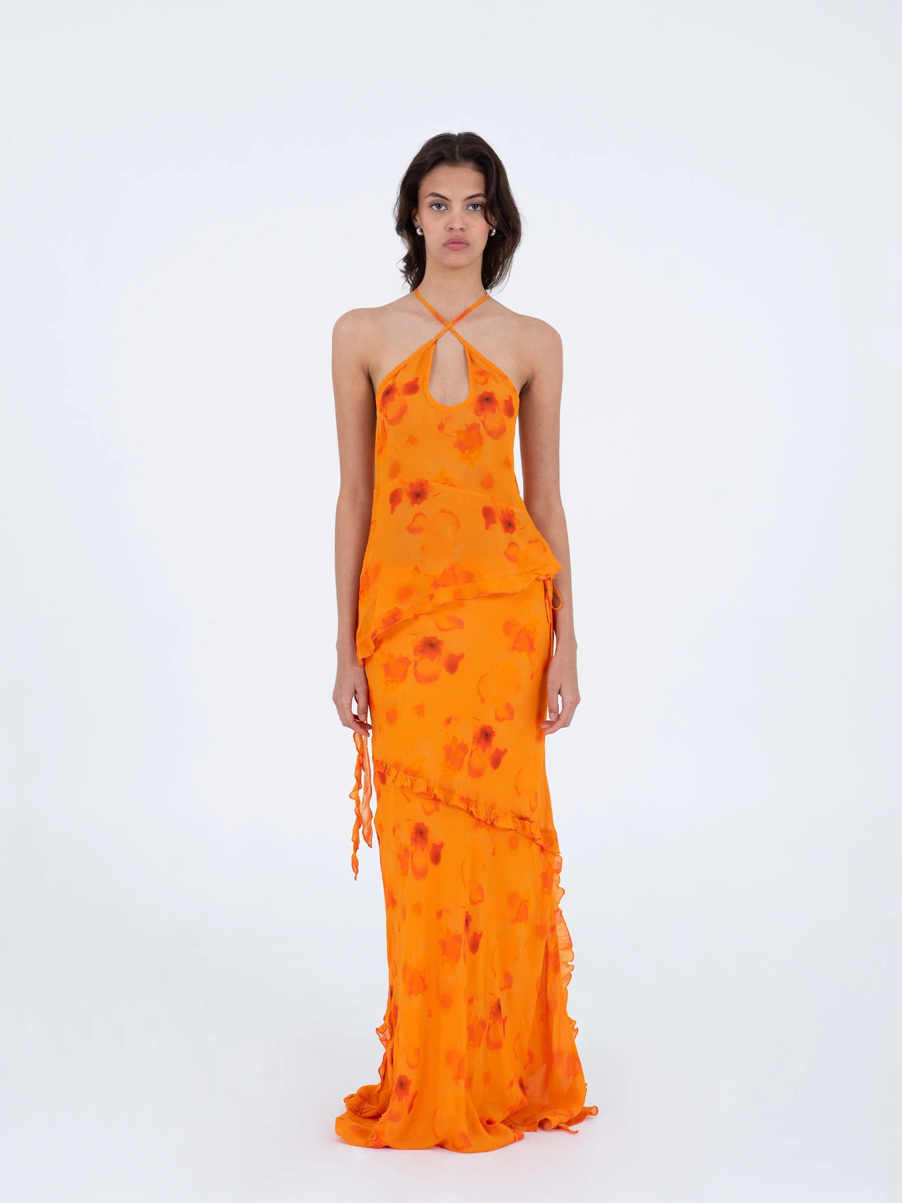 Carmen Says orange long low rise skirt full length front view with layered ruffles and adjustable side straps elegant summer silhouette