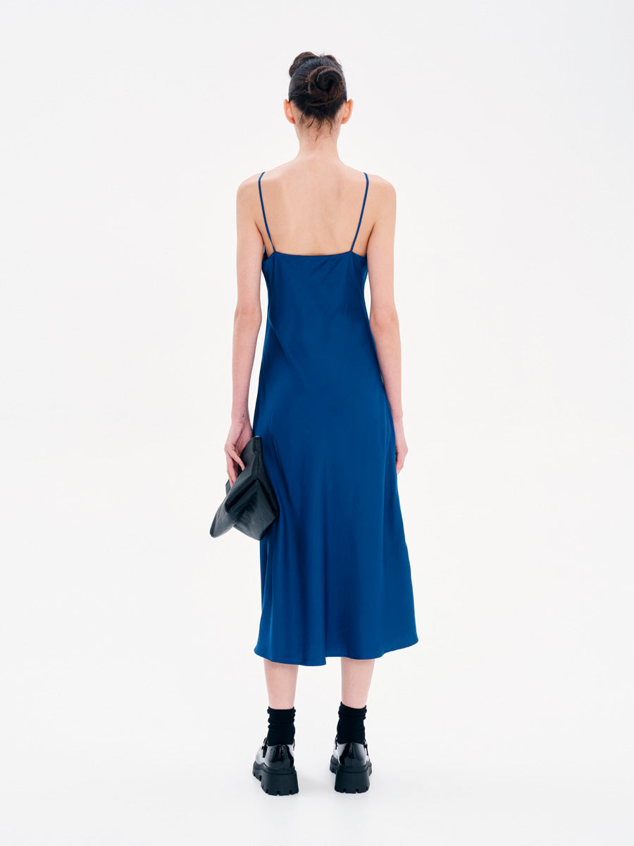 Kourbela blue midi dress back view highlighting halter neckline and straight silhouette