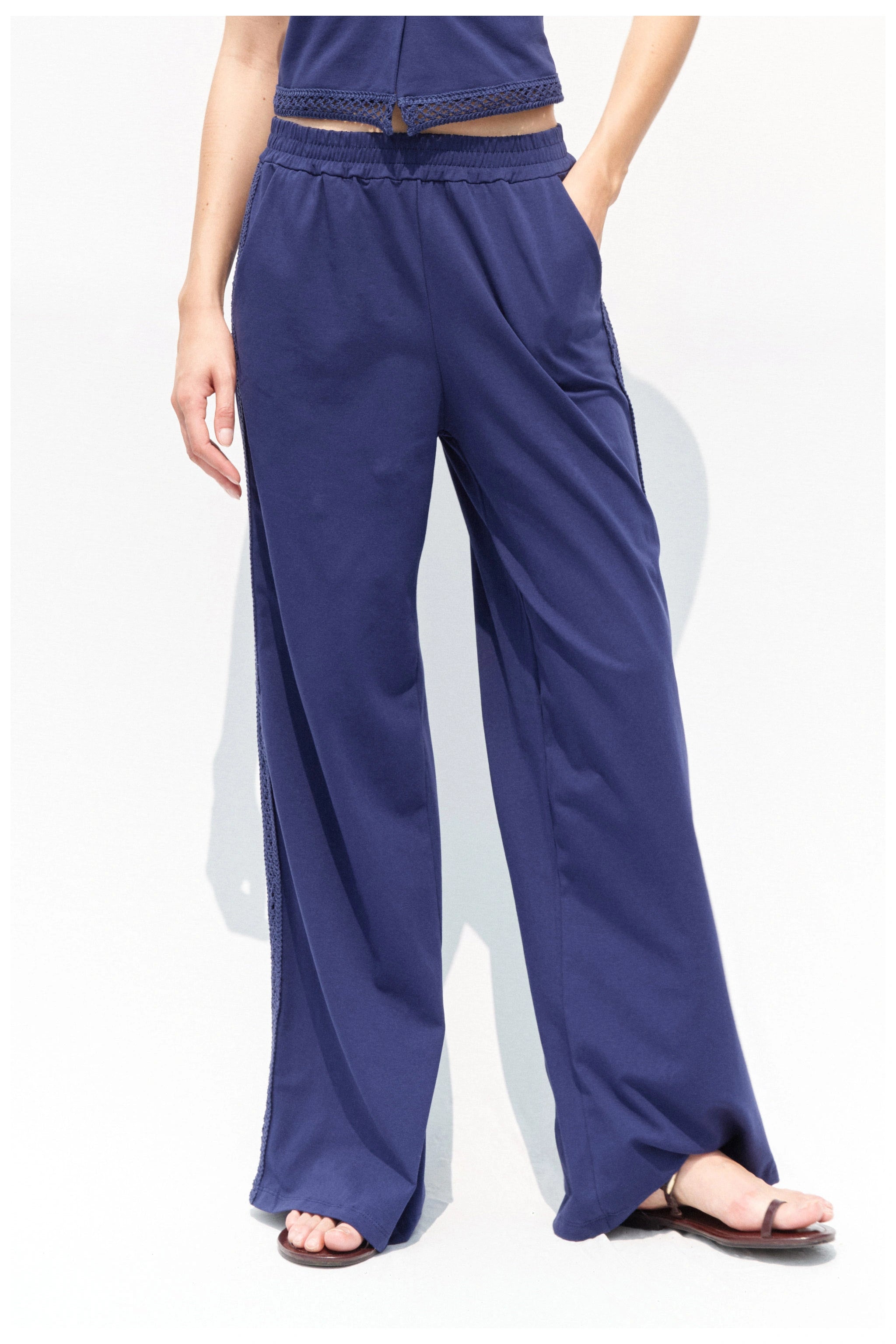 Blue wide leg trousers detail view
