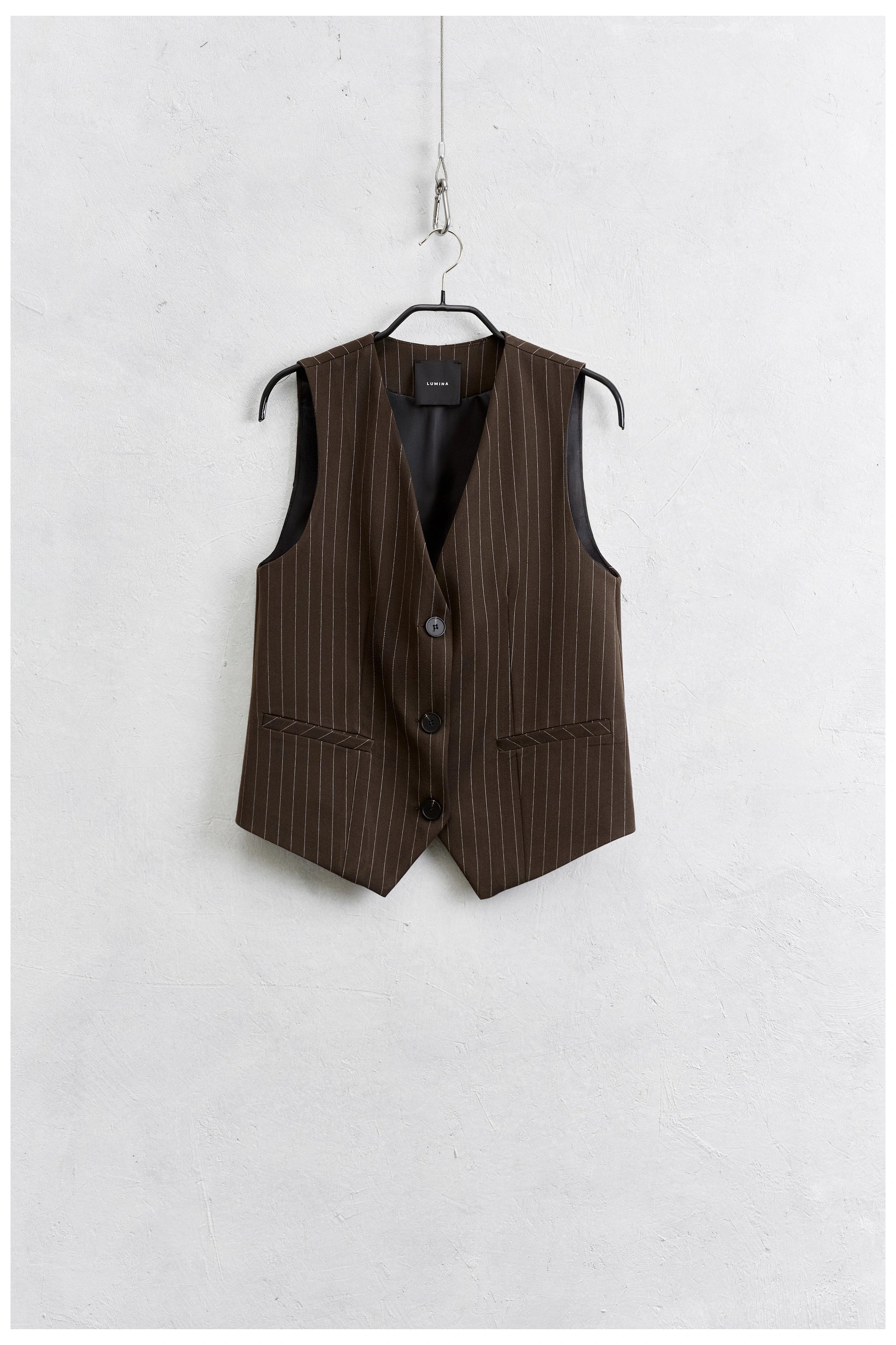 Rich brown button front vest flat view