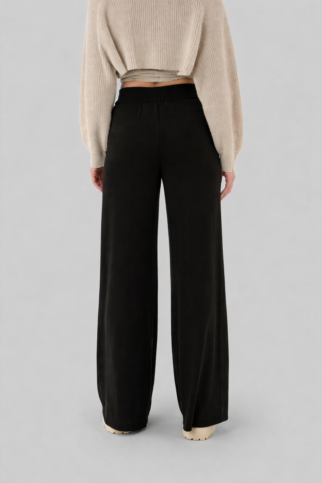 Black wide leg trousers back view