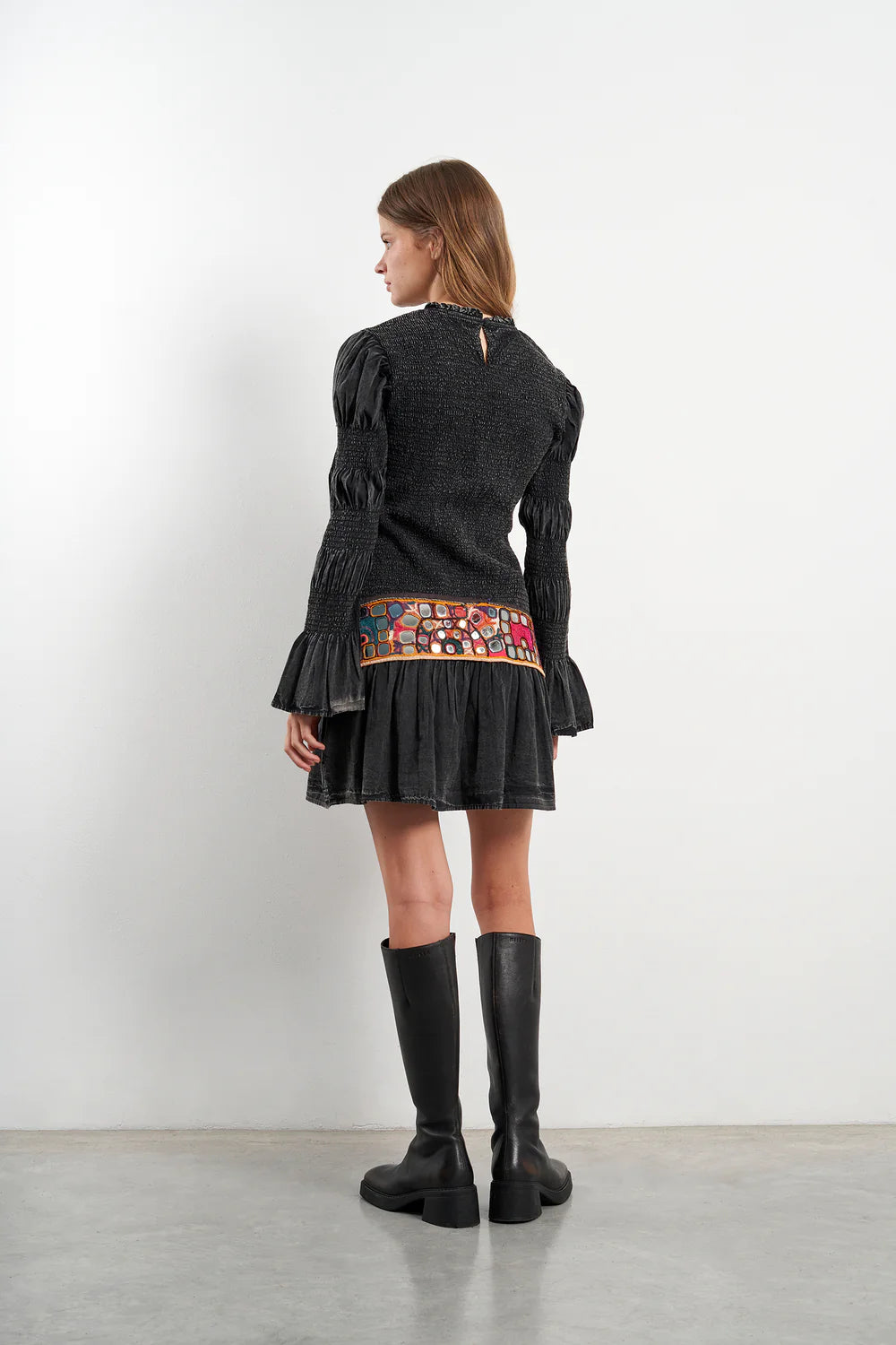 Par Escala washed black long-sleeved mini dress back view with relaxed silhouette