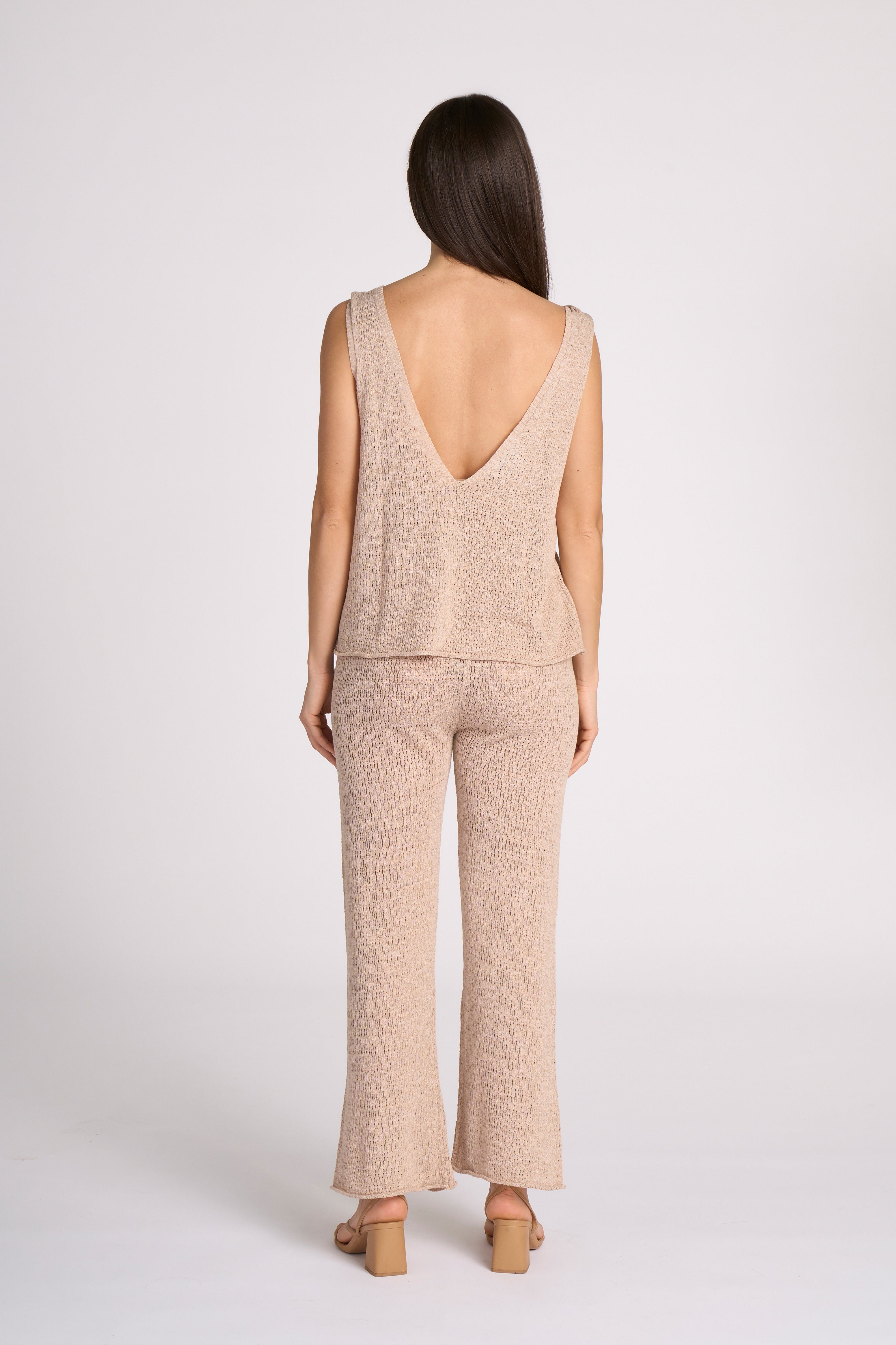 Valeria Set beige knitted two piece set back view on model sleeveless top